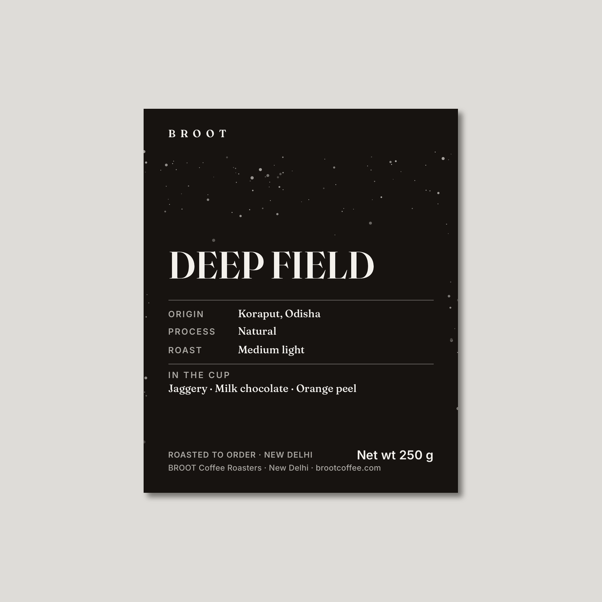 DEEP FIELD 250 g label on black with a field of stars: Koraput, Odisha, natural, medium light