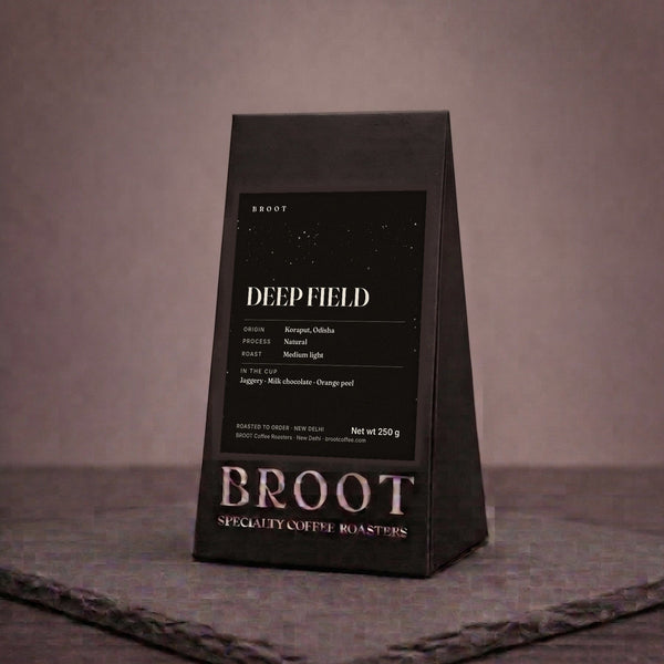 DEEP FIELD 250 g pack on black with a field of stars: Koraput, Odisha, natural, medium light