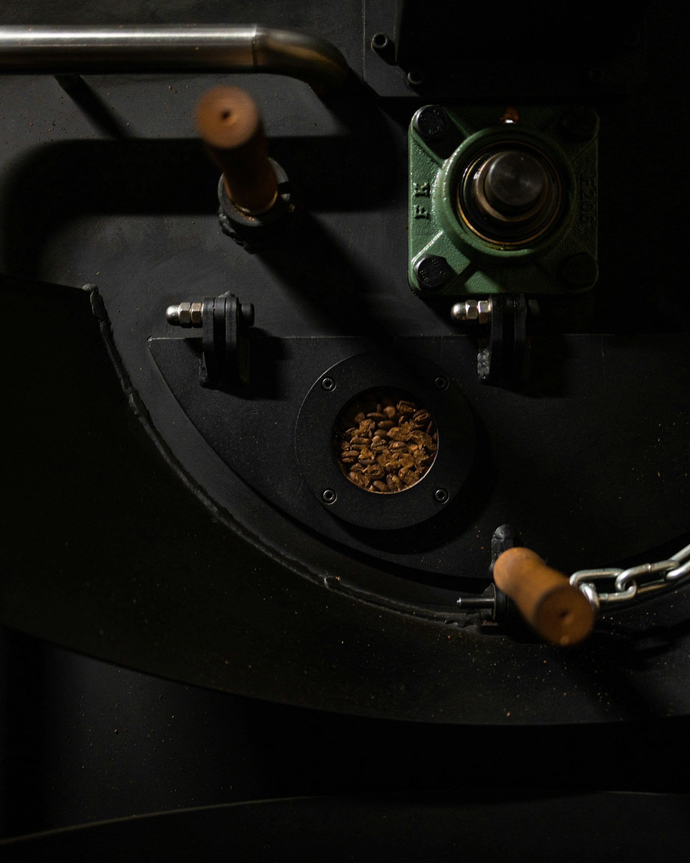 Coffee beans at the trier port of a roaster
